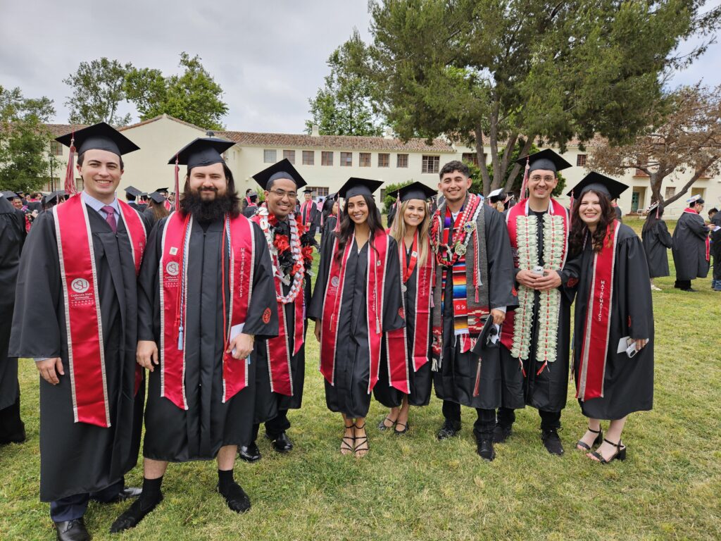 Mathematics Students in cap and gown on the day of graduation. 